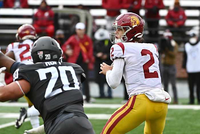 USC Trojans quarterback Jaxson Dart (2) drops back for a pass against the Washington State Cougars.